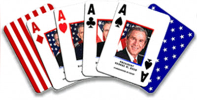 A fan of playing cards with American flag designs and portrait cards, including an Ace of Spades and several face-up cards showing a portrait on a white card background.