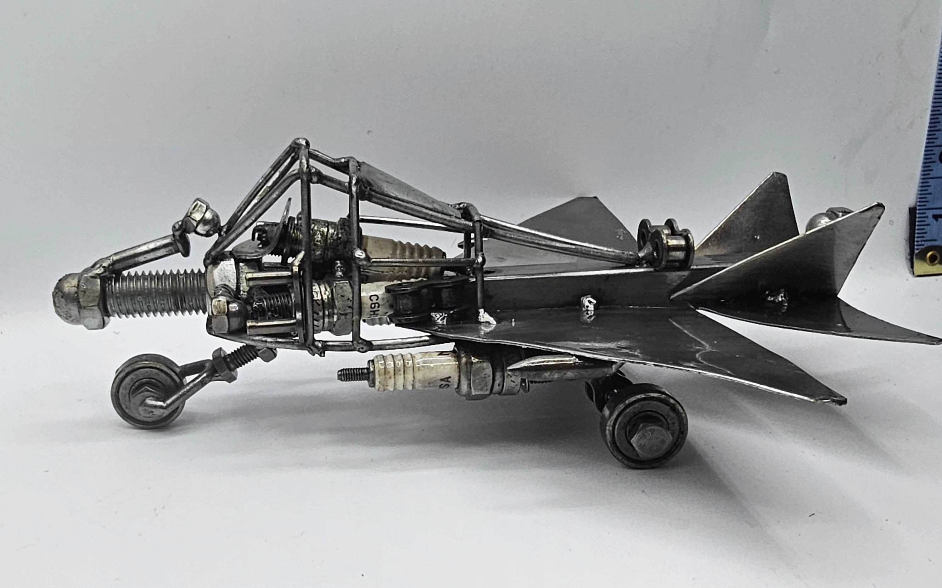 MIG-21 Fishbed fighter jet spark plug metal art sculpture, aviation collectible full view