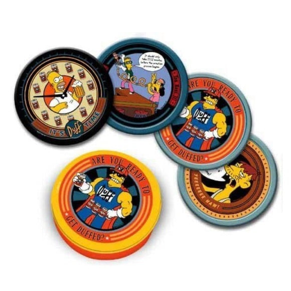 Five circular Simpsons-themed coasters arranged on a plain white background. The coasters feature colorful cartoon artwork including Bart Simpson, Homer Simpson, and Maggie Simpson, with phrases such as 'ARE YOU READY TO GET DUFFED?' and 'MISS MATH IS HARD.