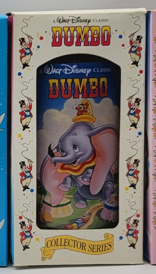 Walt Disney Classic Dumbo Collector Series book box, featuring the classic illustration of Dumbo the elephant on the front cover with colorful circus-themed border illustrations.