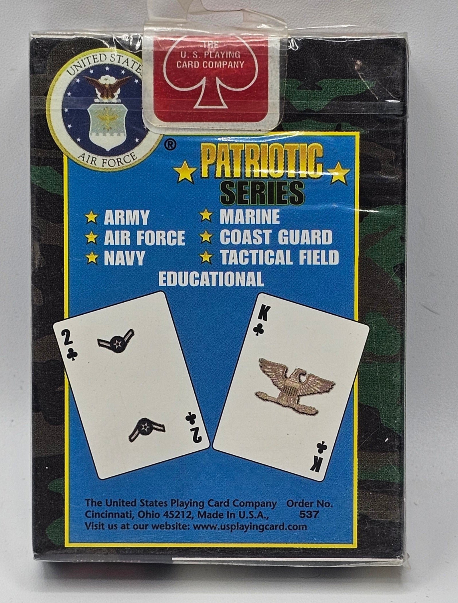Patriotic Series Educational playing card deck box by The United States Playing Card Company, featuring military insignia and sample cards on the front.