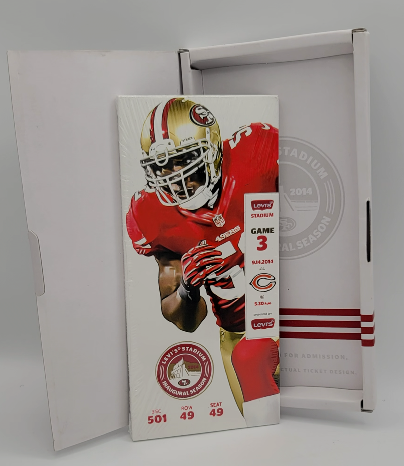 A collectible football ticket for Levi's Stadium 2014 Game 3, displayed in front of its white presentation box. The ticket features a photo of San Francisco 49ers player Brandon Harris in his red and gold uniform, along with team logos and stadium details.