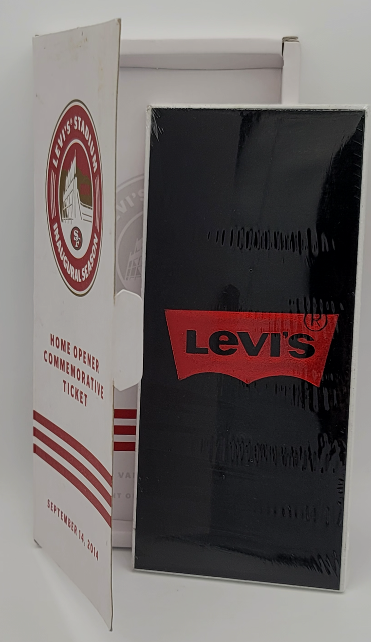 A Levi's home opener commemorative ticket set, featuring a black booklet with the red Levi's logo and a white ticket insert with red stripes and the Levi's St. Louis World Series logo.