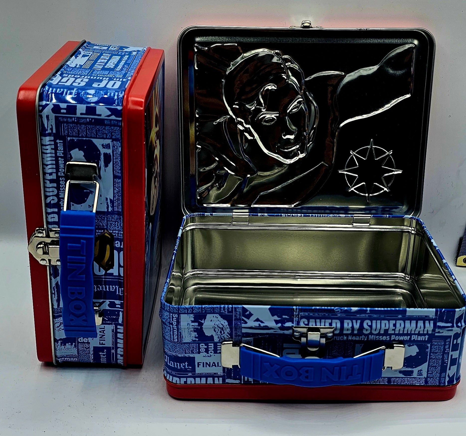 Superman Daily Planet red and blue embossed lunch box, DC Comics collectible