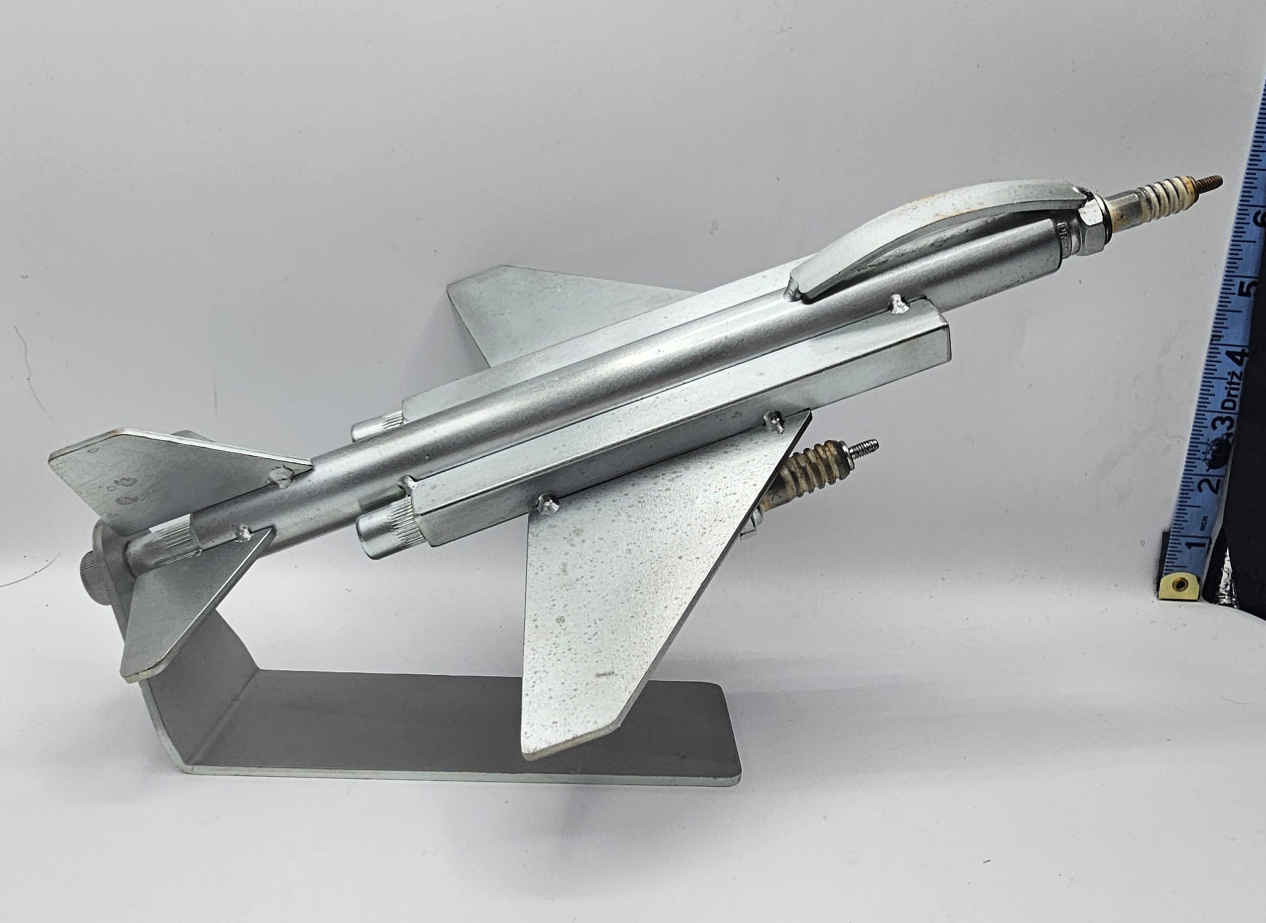 F-4 Phantom fighter jet metal art made from a spark plug, aviation collectible side view