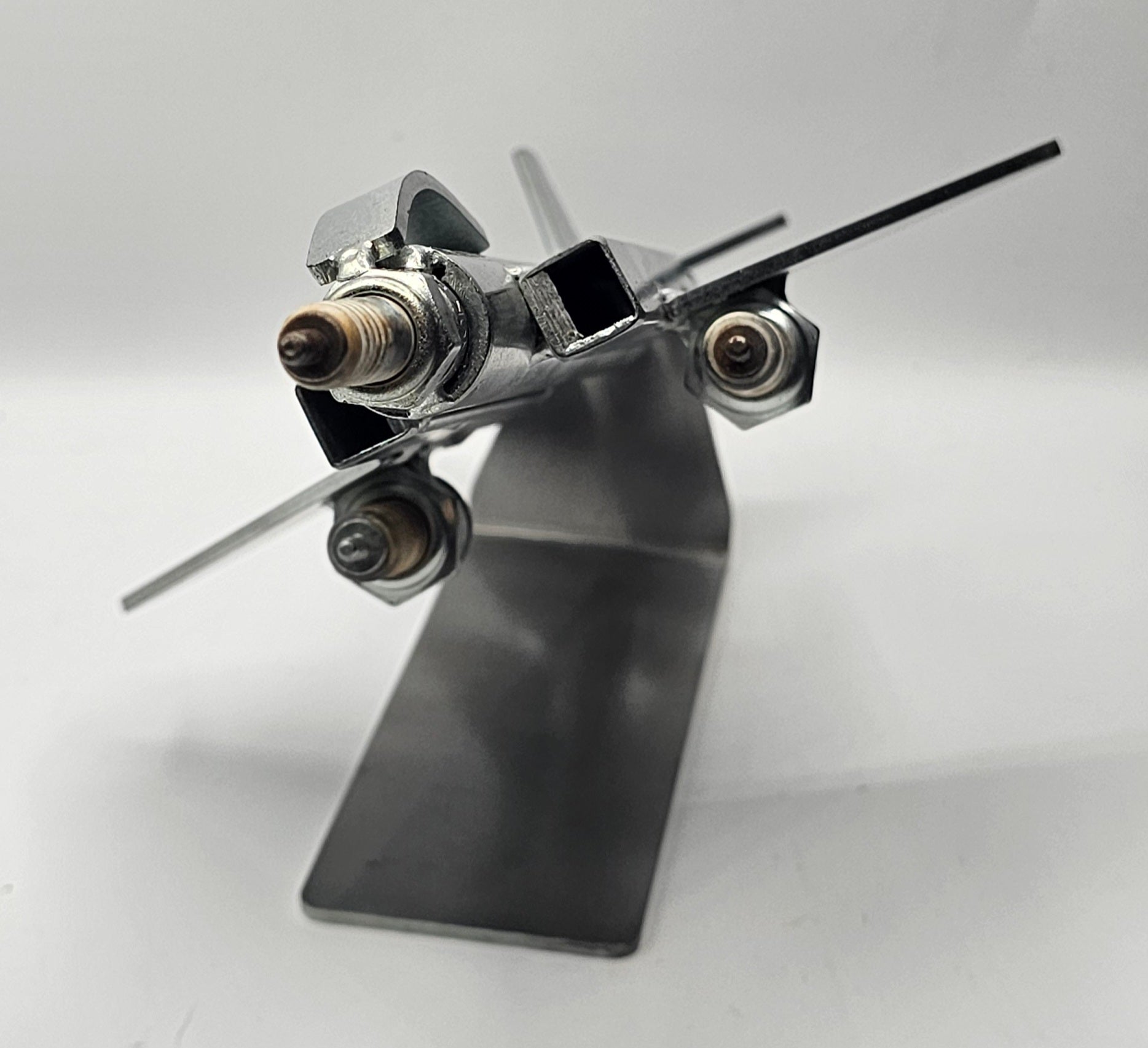 F-4 Phantom spark plug fighter jet art, aviation desk collectible close-up view