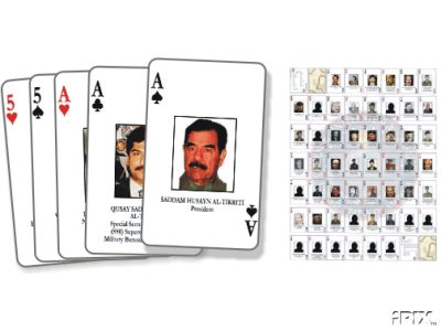 A set of playing cards featuring portraits of Saddam Hussein, with the Ace cards showing his portrait and the 5 of hearts showing red hearts. A sheet of multiple cards is shown on the right.